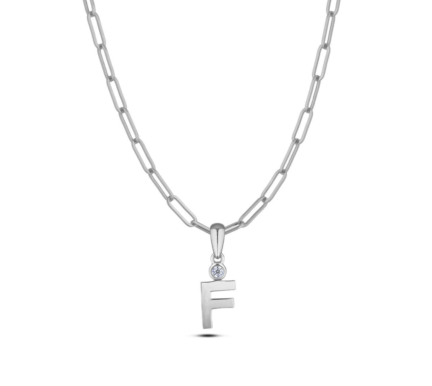 Sterling silver Canadian diamond pendant necklace featuring a black style letter F design, displayed on a matching silver paperclip chain.