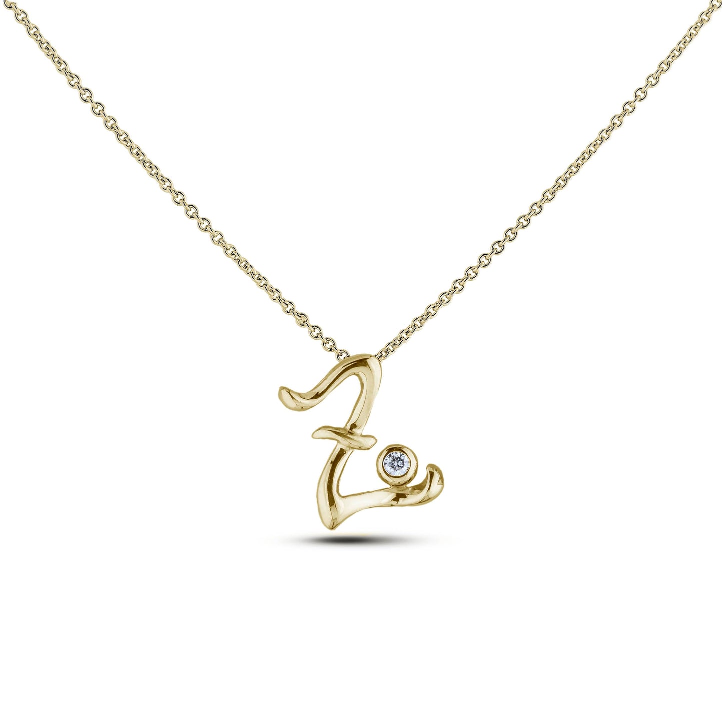 Yellow Gold Canadian diamond pendant necklace featuring a script alphabet letter Z design, displayed on a matching silver rolo chain.