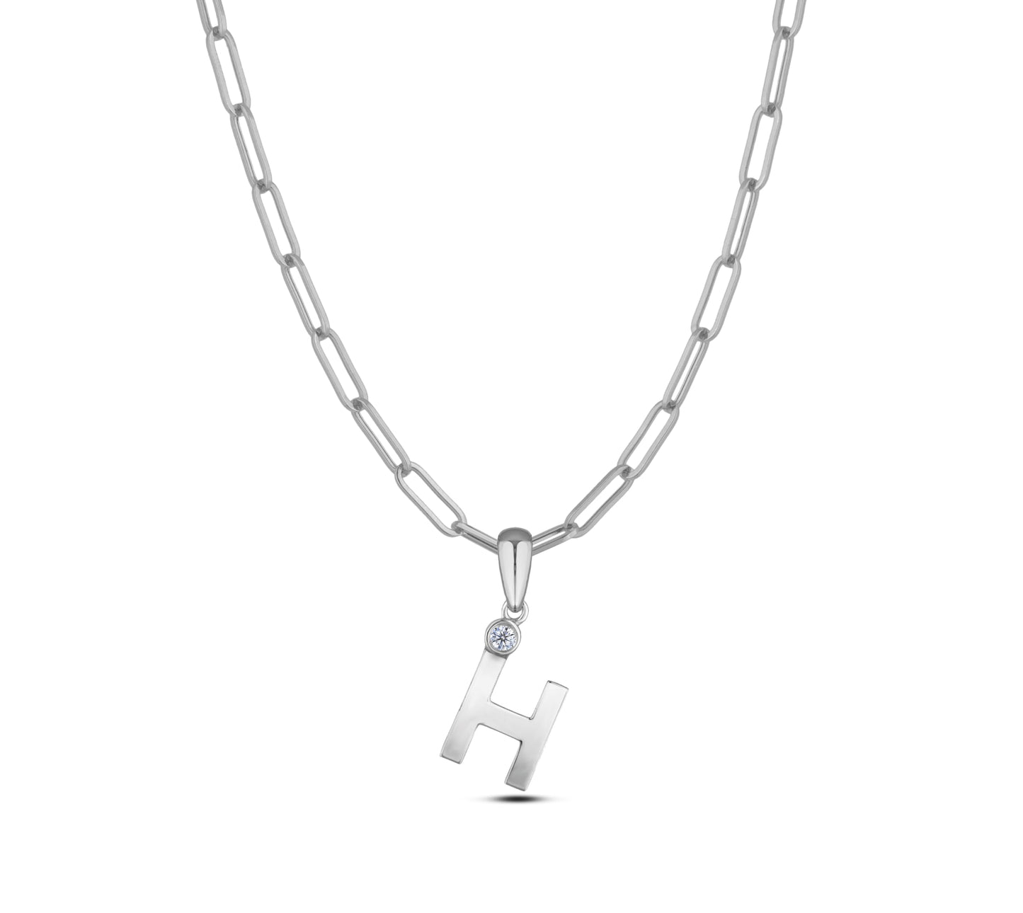 Sterling silver Canadian diamond pendant necklace featuring a black style letter H design, displayed on a matching silver paperclip chain.