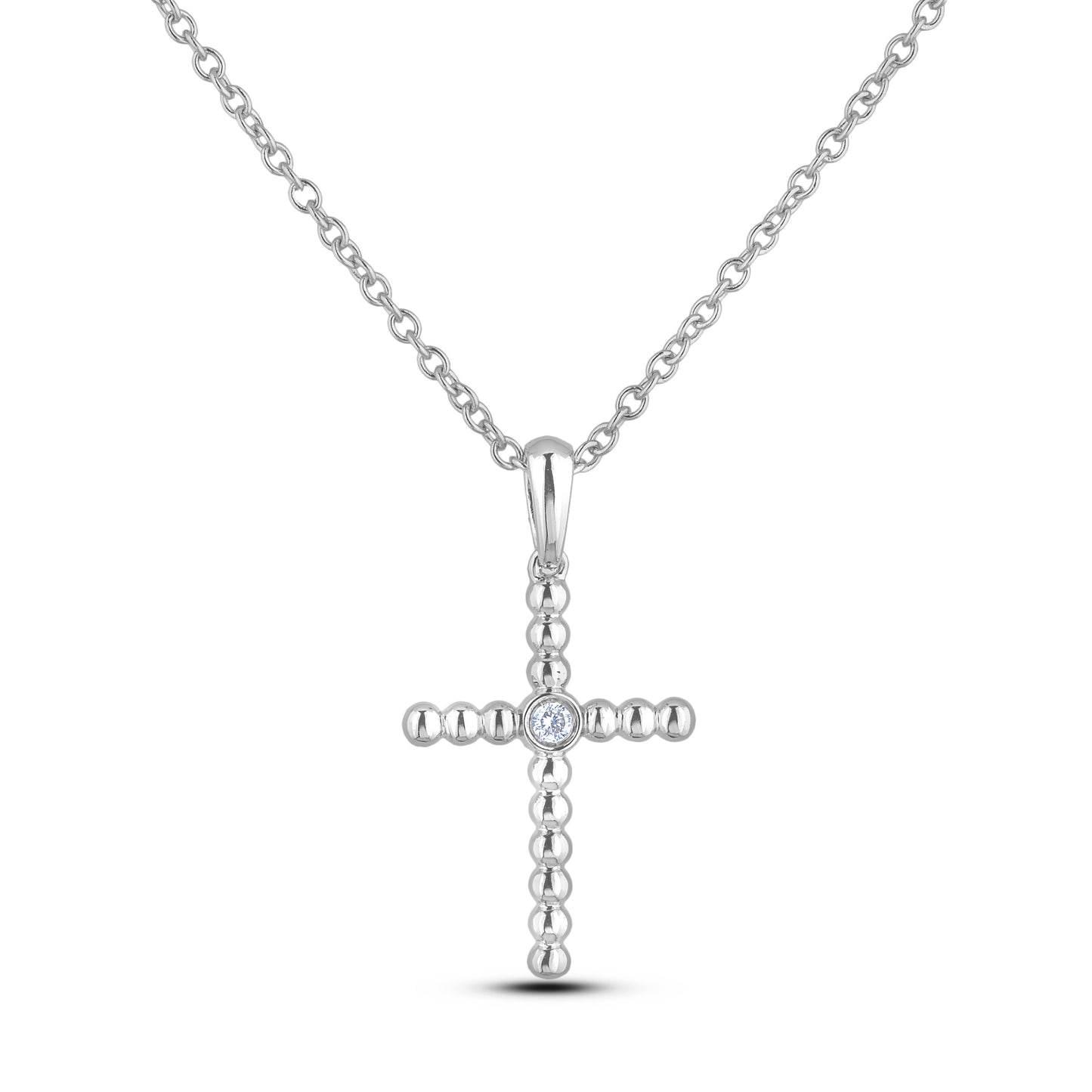 Sterling silver cross pendant featuring a round brilliant cut, canadian diamond in the center.