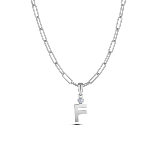 Sterling silver Canadian diamond pendant necklace featuring a black style letter F design, displayed on a matching silver paperclip chain.
