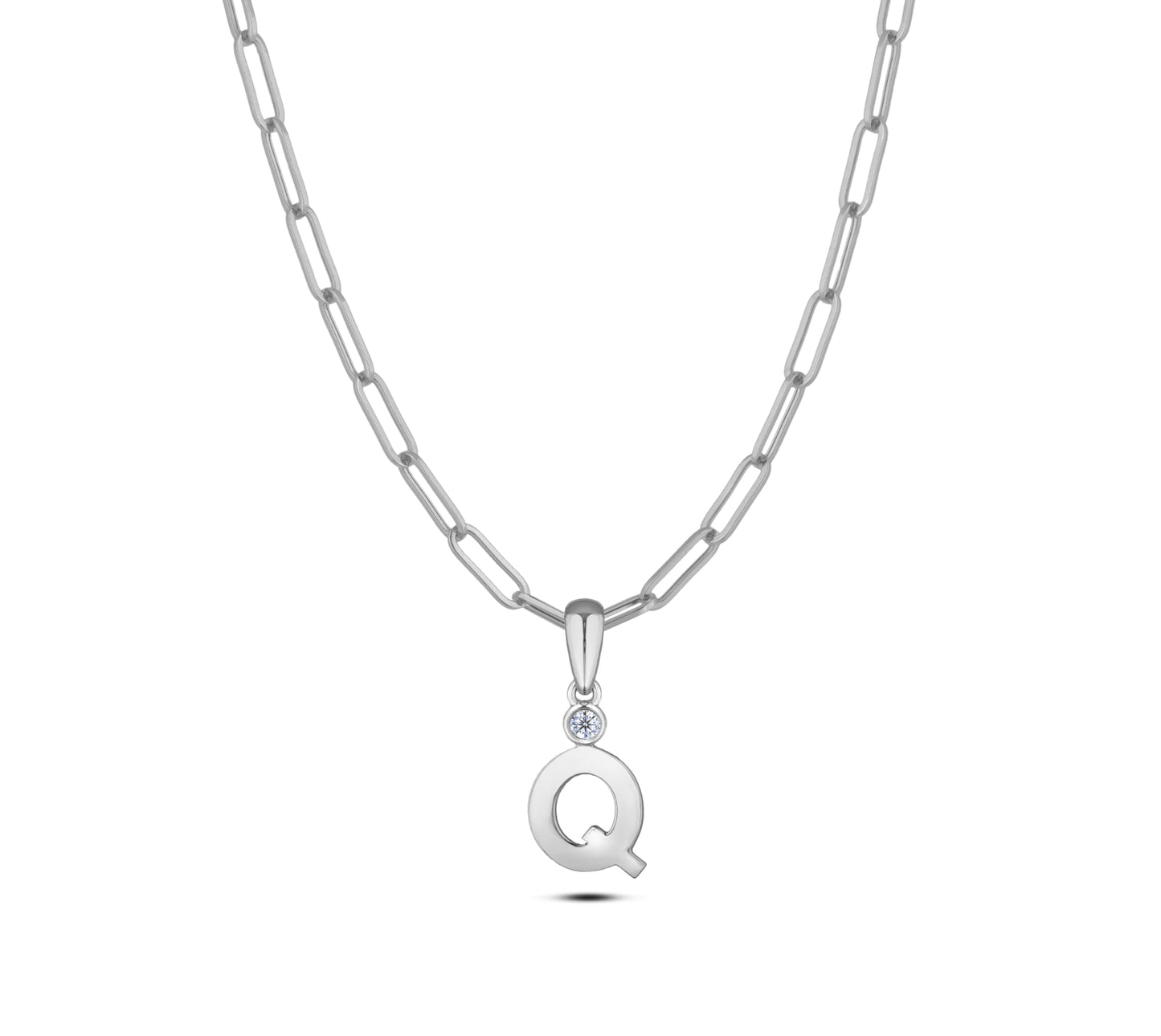 Sterling silver Canadian diamond pendant necklace featuring a black style letter Q design, displayed on a matching silver paperclip chain.
