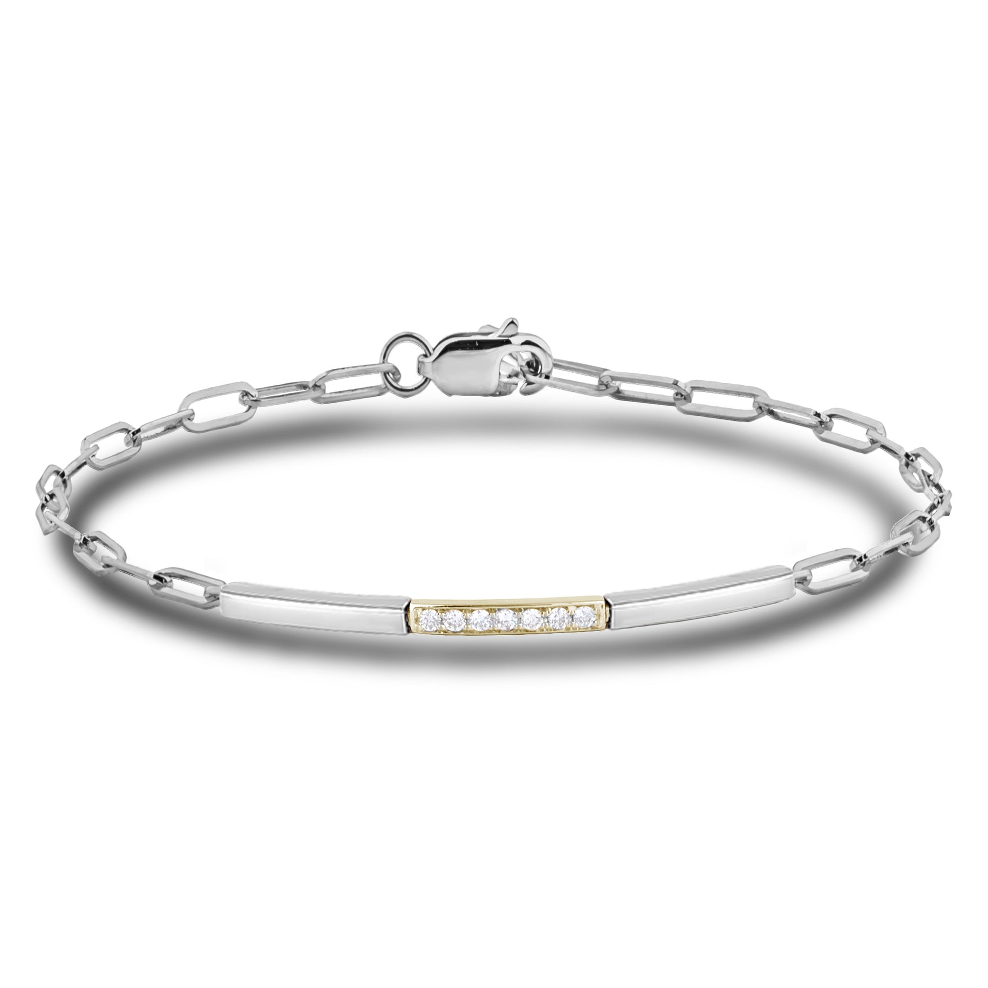 A sterling silver paperclip link bracelet featuring alternating bars in polished sterling silver and 10K yellow gold. The central yellow gold bar is set with seven natural Canadian diamonds, flanked by sleek sterling silver bars and a secure lobster claw clasp.