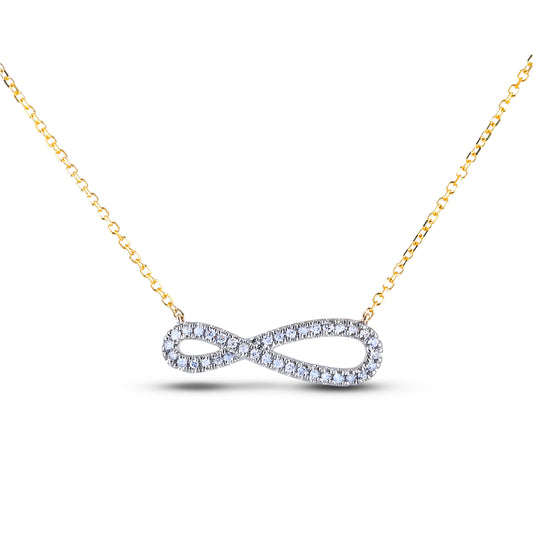 Gold necklace with a diamond infinity pendant on a white background