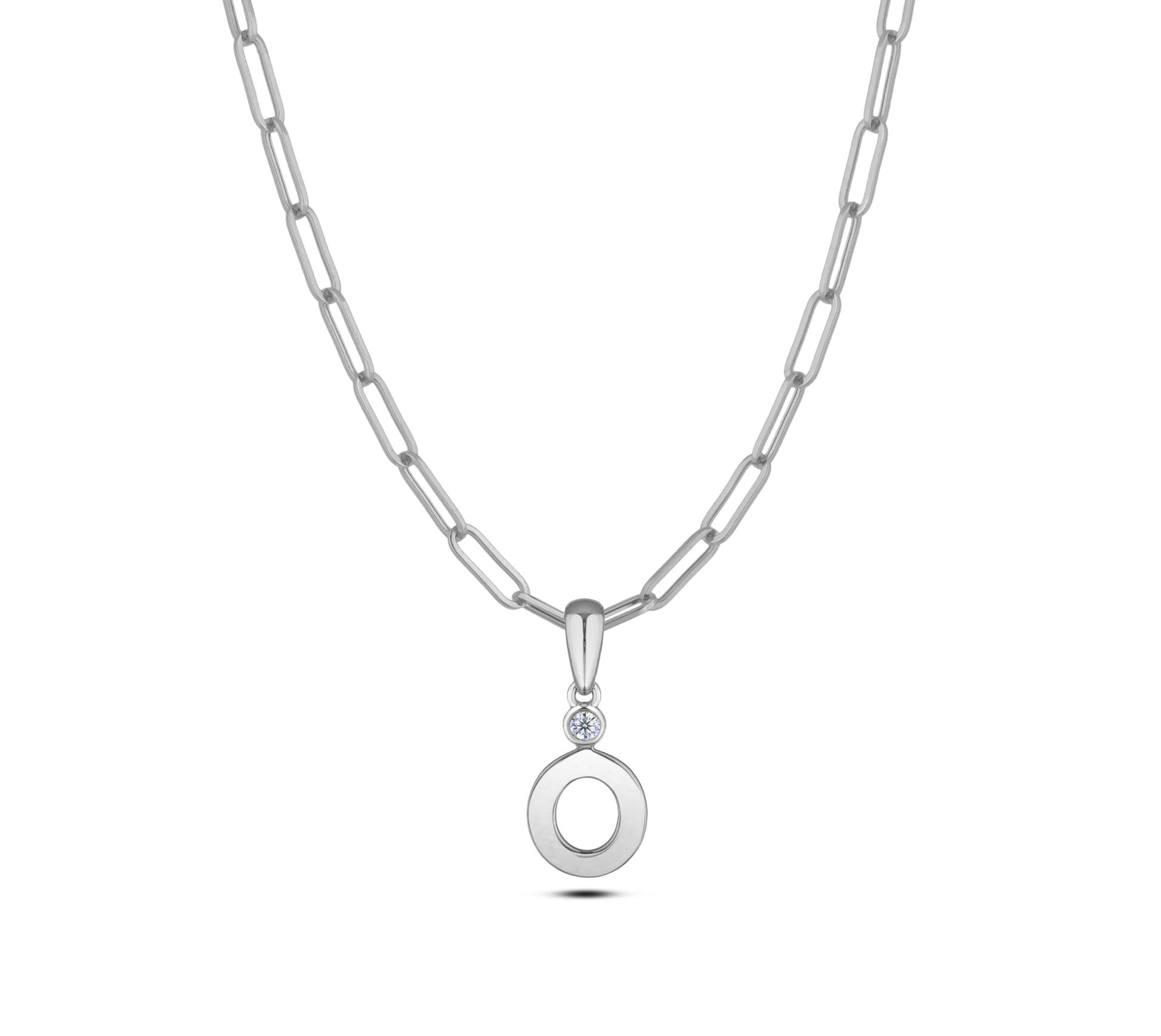 Sterling silver Canadian diamond pendant necklace featuring a black style letter O design, displayed on a matching silver paperclip chain.
