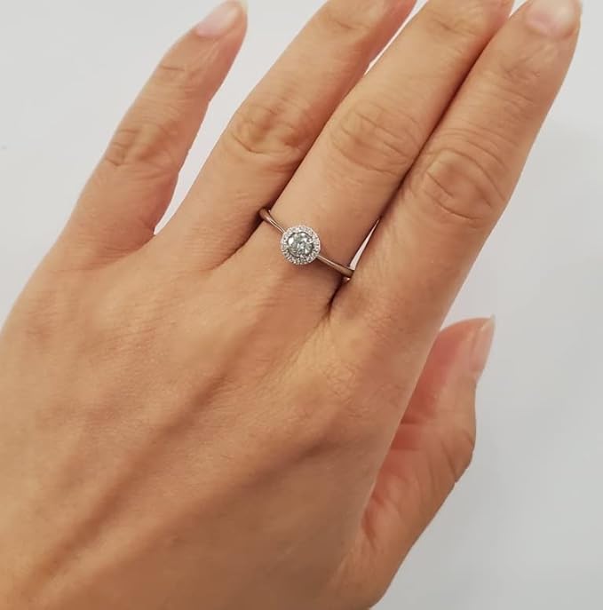 model wearing halo engagement ring, canadian diamond