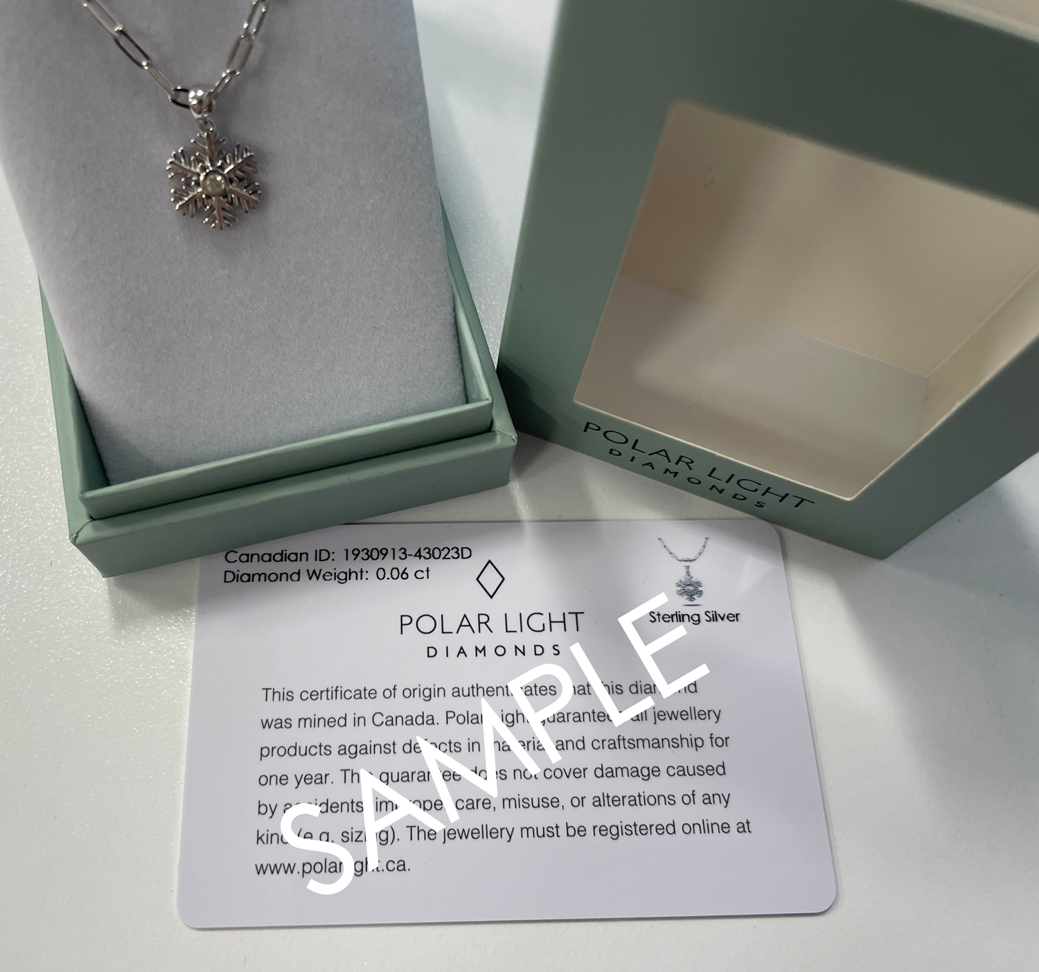 925 Sterling Silver 0.06 Ct Natural Canadian Diamond Snowflake Pendant and Chain in Polar Light Diamonds box packaging and certificate sample