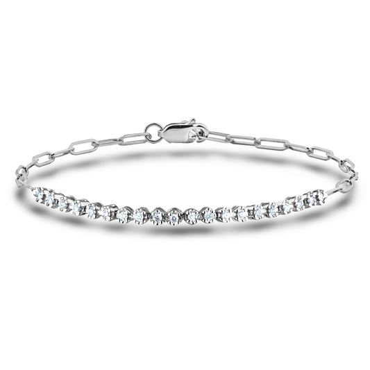 925 sterling silver half-tennis paperclip bracelet featuring 0.22 carat total weight of natural Canadian diamonds. One half of the bracelet is shimmering diamonds, and the other half consists of high-polish paperclip links. Includes a secure lobster clasp and fits a 7.5-inch wrist.