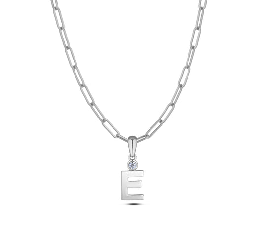 Sterling silver Canadian diamond pendant necklace featuring a black style letter E design, displayed on a matching silver paperclip chain.
