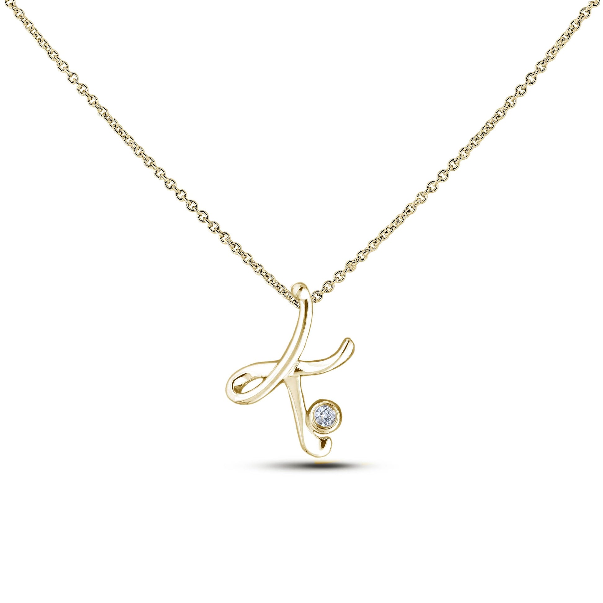 Yellow Gold Canadian diamond pendant necklace featuring a script alphabet letter K design, displayed on a matching silver rolo chain.

