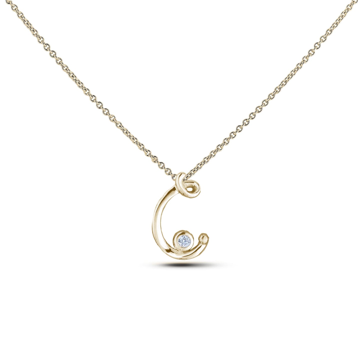 Yellow Gold Canadian diamond pendant necklace featuring a script alphabet letter C design, displayed on a matching silver rolo chain.

