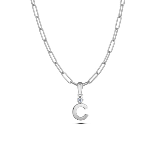 Sterling silver Canadian diamond pendant necklace featuring a black style letter C design, displayed on a matching silver paperclip chain.
