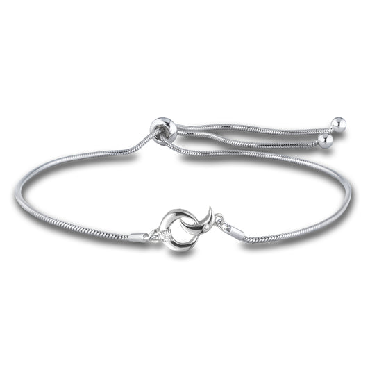 Sterling silver moon bolo style bracelet featuring a round brilliant cut, canadian diamond.