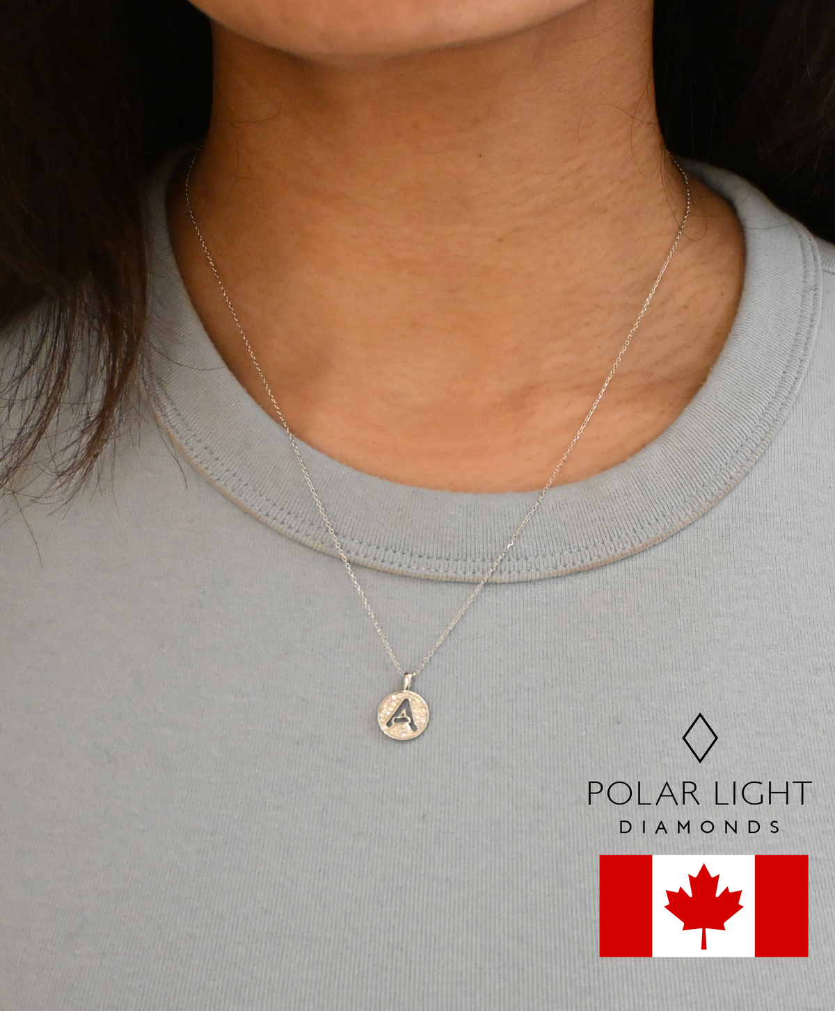 model wearing 10K White Gold Letter A 0.18 Cttw Round Brilliant Canadian Diamonds Alphabet Initial Pendant and Chain (H-I Color, SI1-I1 Clarity)