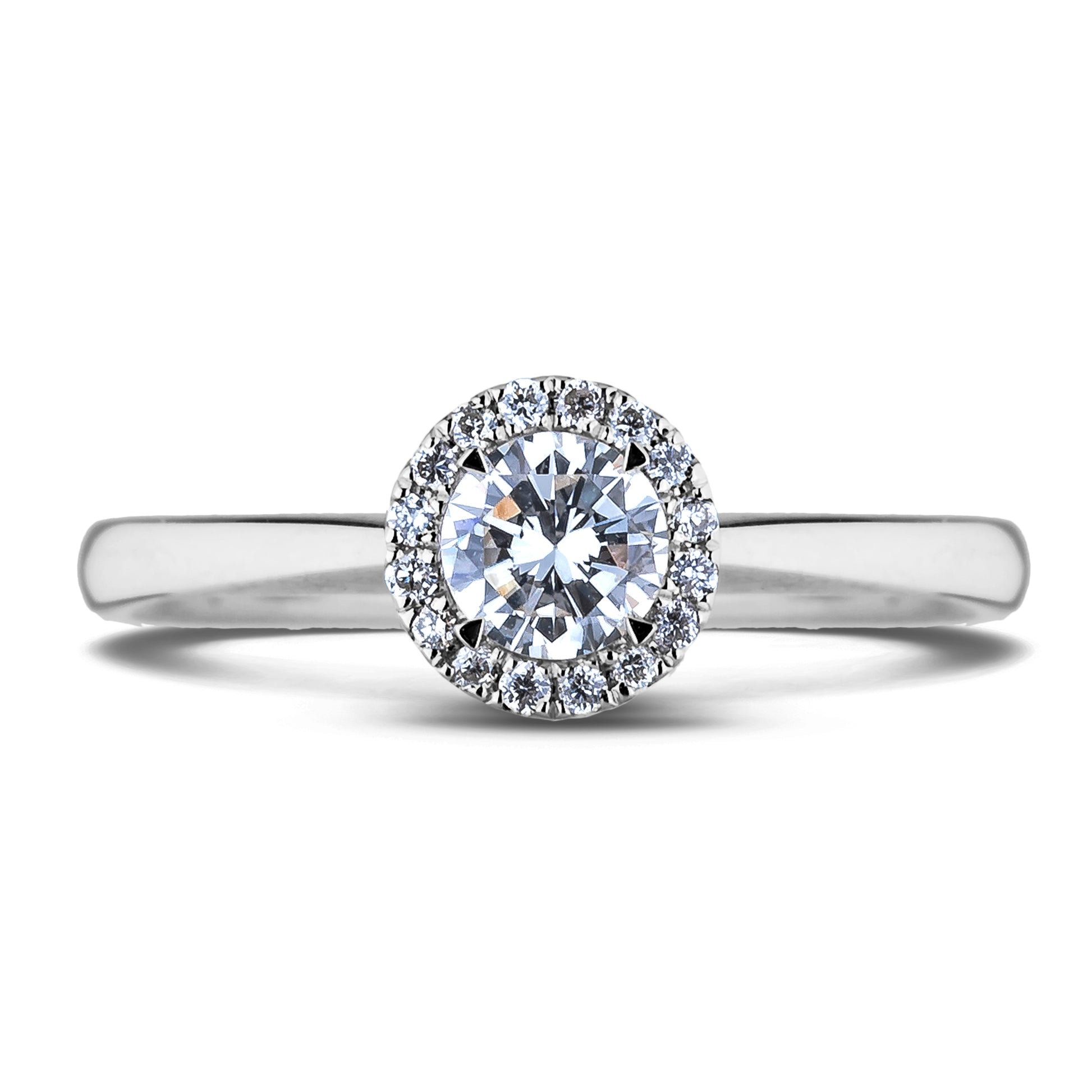 Diamond engagement ring with a halo on a white background