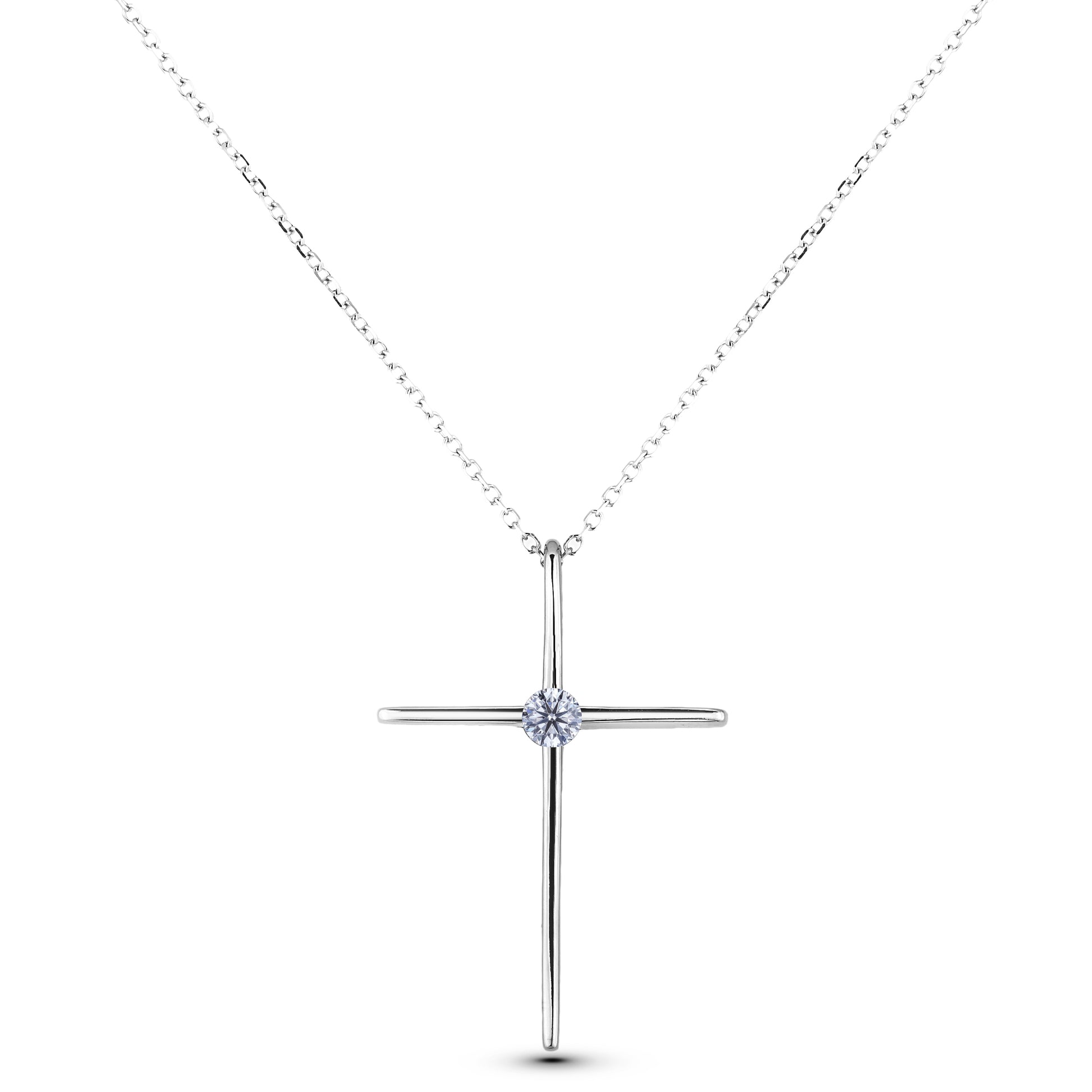 A dainty 925 sterling silver cross pendant featuring a solitaire Canadian diamond at its center. The thin cross charm is paired with a matching silver rolo chain, shown against a clean white background.