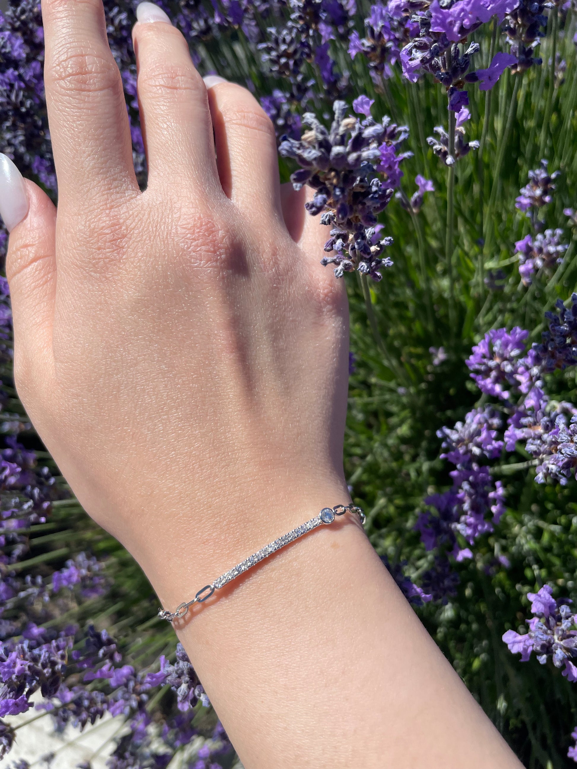 model wearing 925 Sterling Silver 0.28 CTW Canadian Diamond Half Tennis Paperclip Bracelet, elegant bracelet
