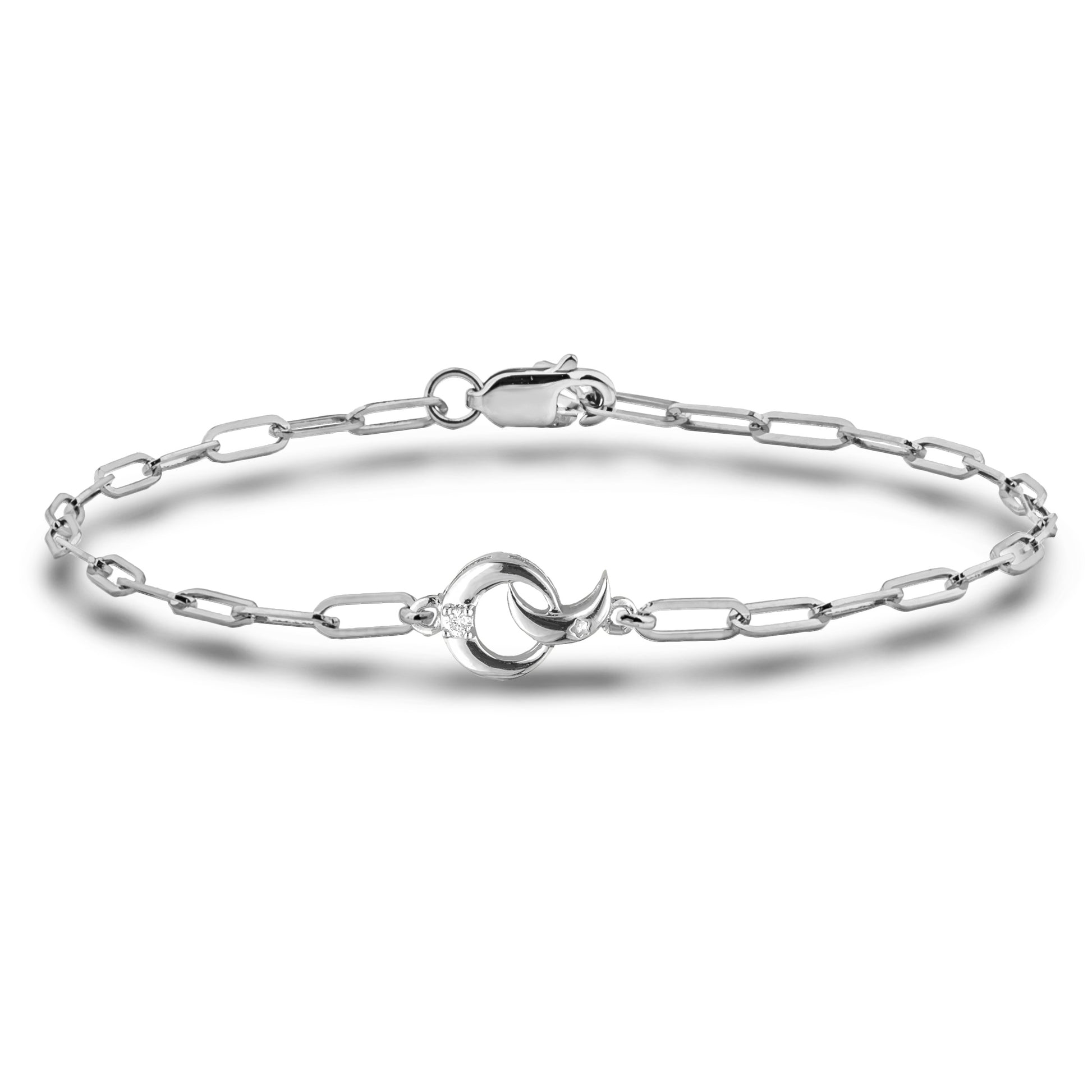 High-polish 925 sterling silver paperclip link bracelet featuring a moon charm design. A natural Canadian diamond is star-set into the moon's curve, adding a celestial touch. This minimalistic piece is finished with a secure lobster clasp.