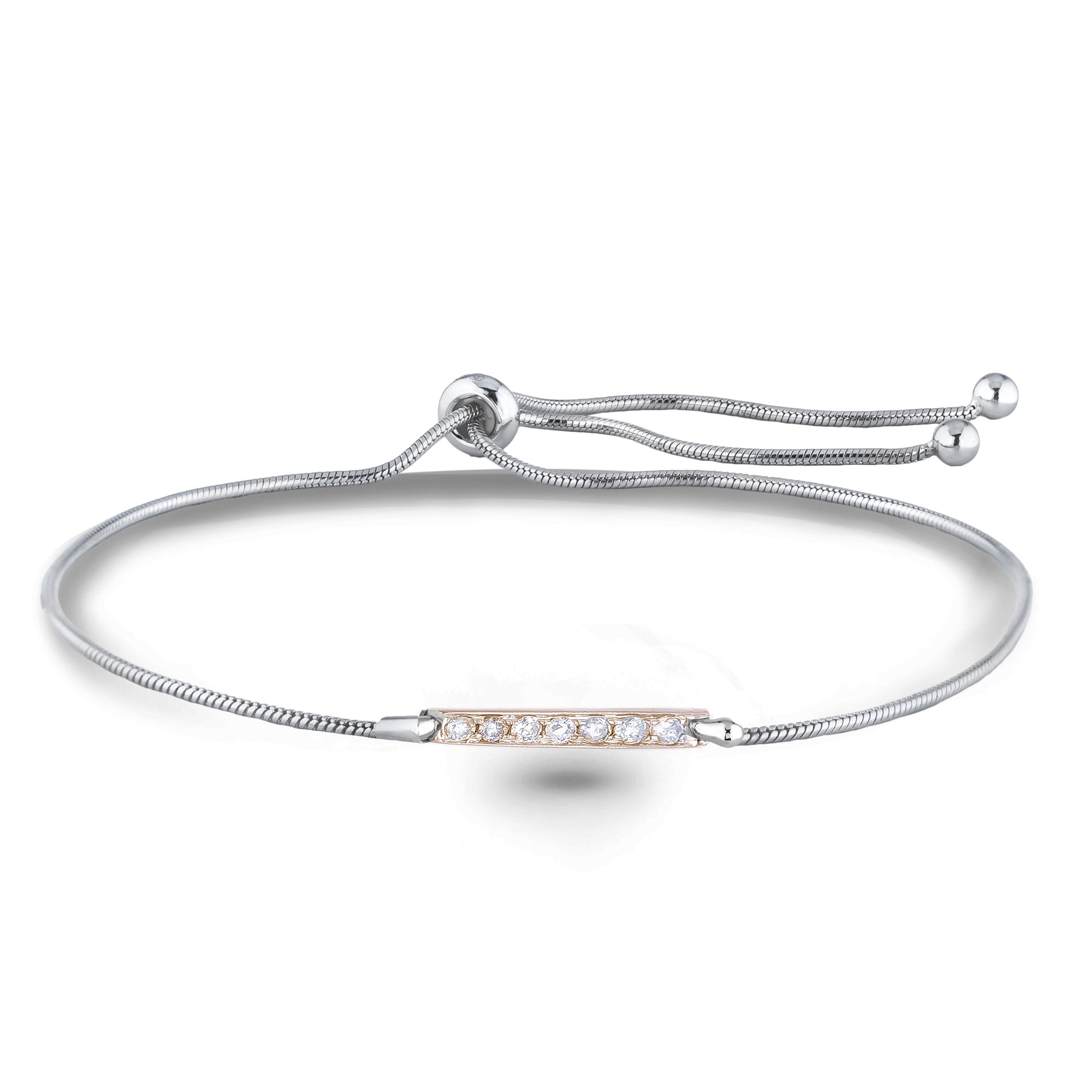 Two-tone adjustable 925 sterling silver bolo bracelet featuring a 10K yellow gold bar charm. The bar is set with brilliant-cut natural Canadian diamonds, creating a warm contrast against the polished silver chain. The bracelet is finished with a sliding clasp and beaded end caps for an easy, customizable fit on any wrist size.