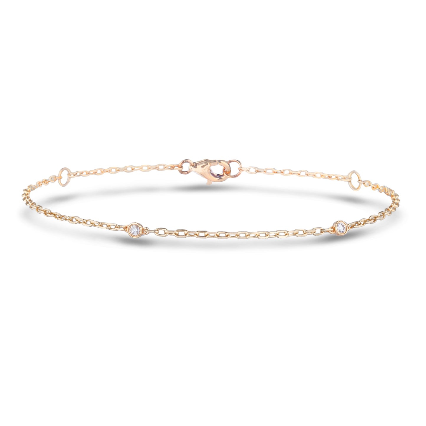 10k Gold bracelet with  three diamonds on a white background