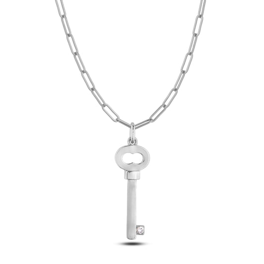 925 Sterling silver key shaped charm with bezel set Canadian diamond hanging from a paperclip chain.