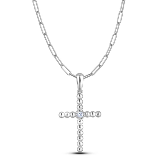 Sterling silver bubble cross design pendant necklace with center bezel set Canadian diamond, paired with a paperclip chain on a white background