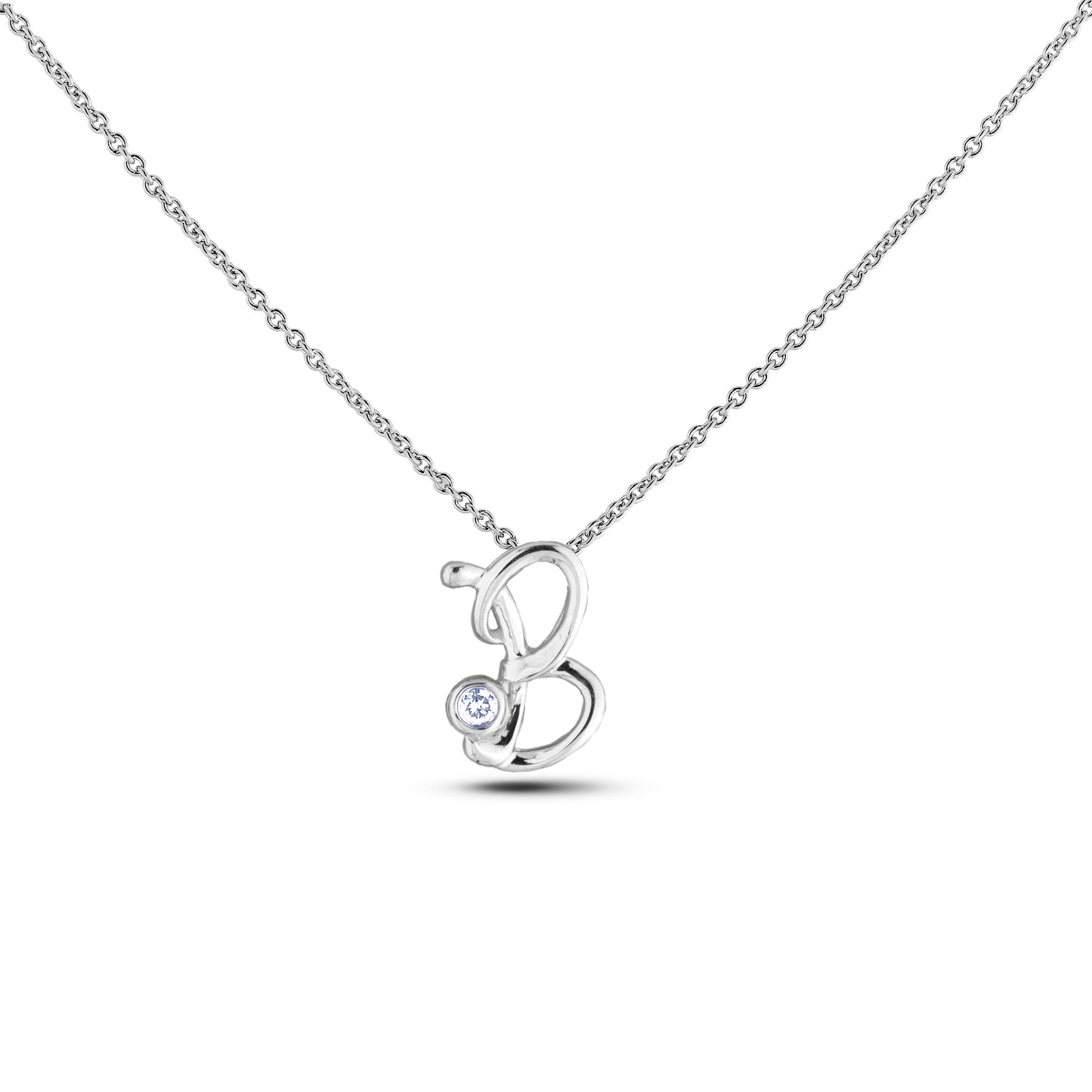 Sterling silver Canadian diamond pendant necklace featuring a script alphabet letter B design, displayed on a matching silver rolo chain.

