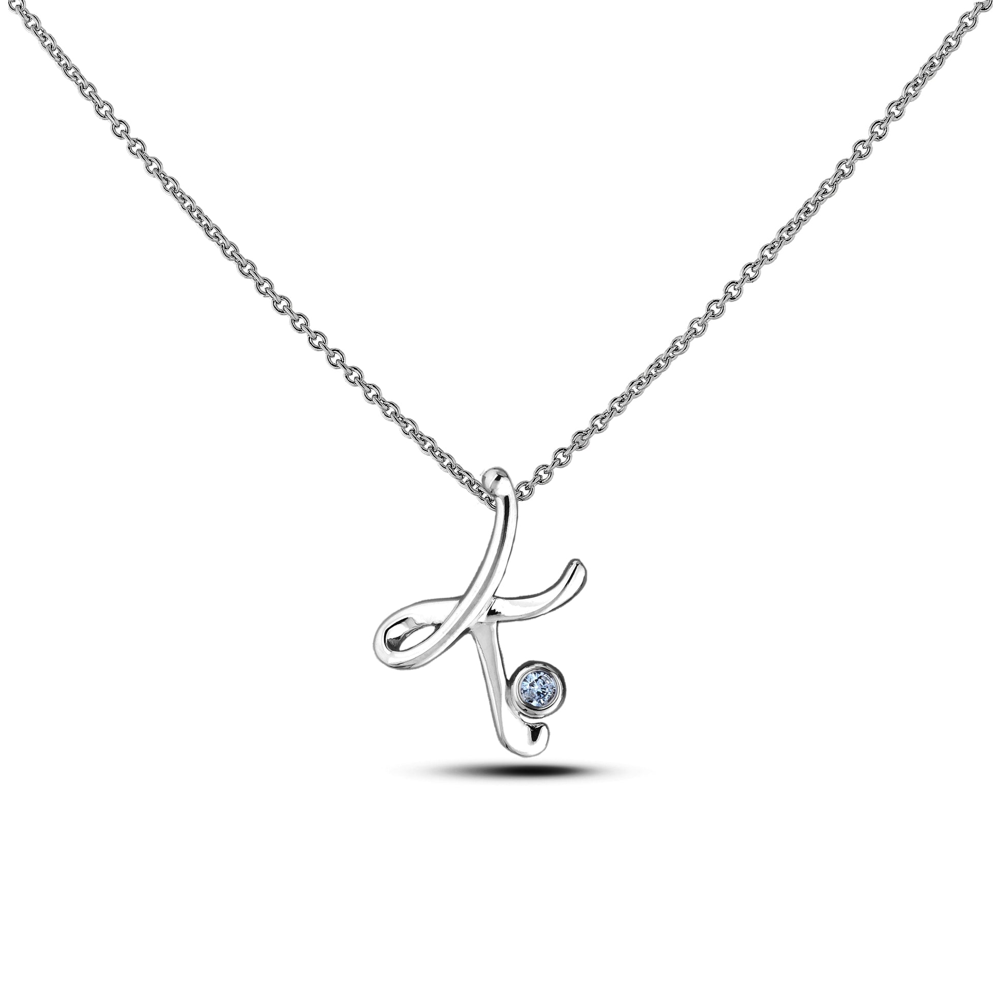 Sterling silver Canadian diamond pendant necklace featuring a script alphabet letter K design, displayed on a matching silver rolo chain.

