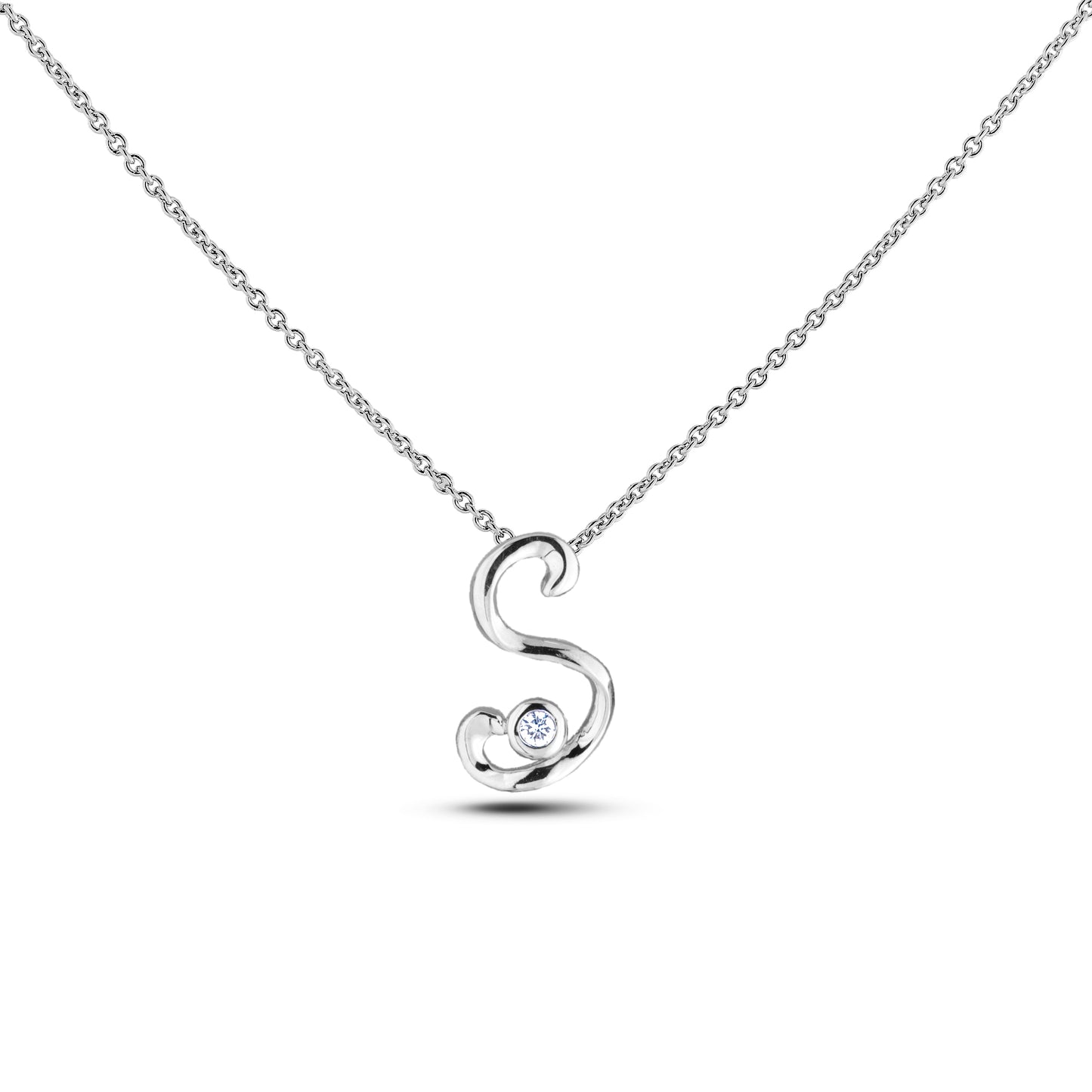 Sterling silver Canadian diamond pendant necklace featuring a script alphabet letter S design, displayed on a matching silver rolo chain.

