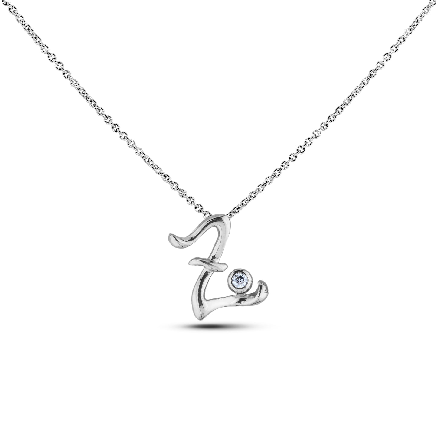 Sterling silver Canadian diamond pendant necklace featuring a script alphabet letter Z design, displayed on a matching silver rolo chain.

