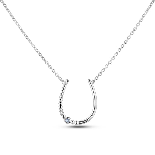 Sterling silver horseshoe lucky charm pendant featuring a round brilliant cut, canadian diamond.