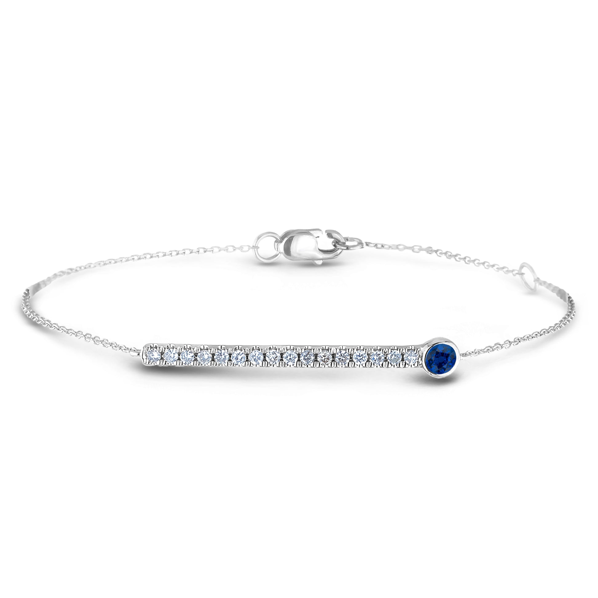 Silver bracelet with a blue sapphire gemstone and diamonds on a white background
