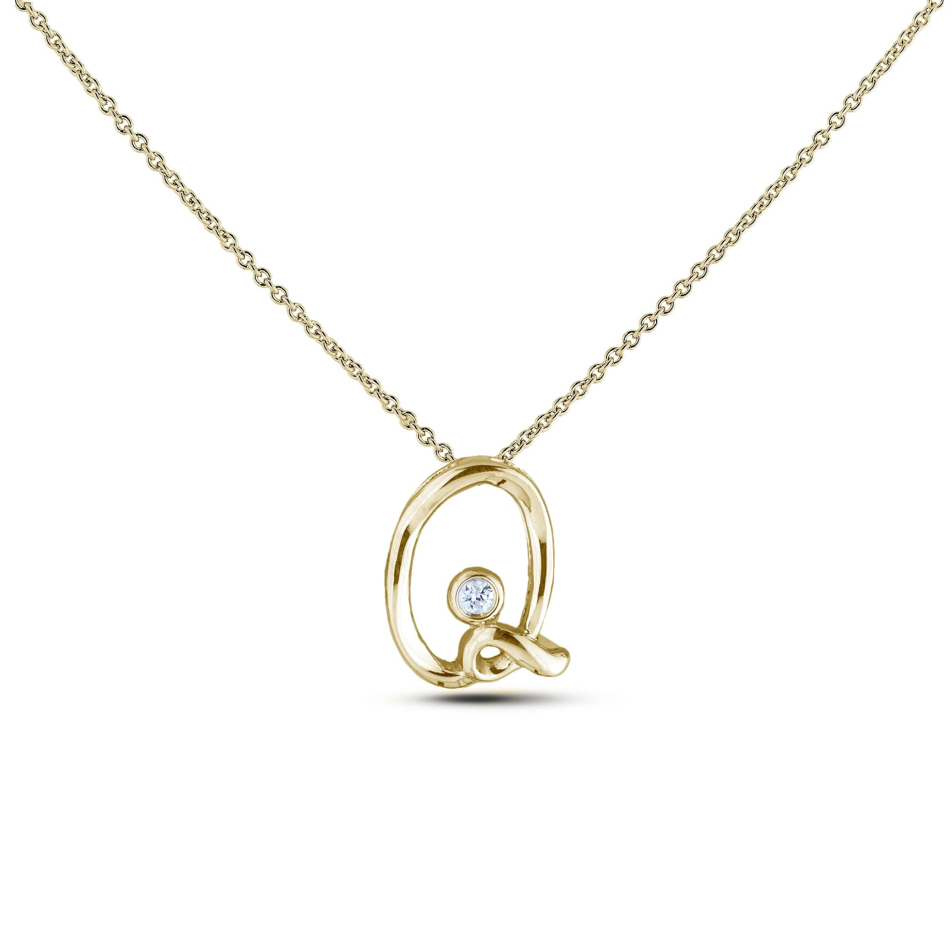 Yellow Gold Canadian diamond pendant necklace featuring a script alphabet letter P design, displayed on a matching silver rolo chain.

