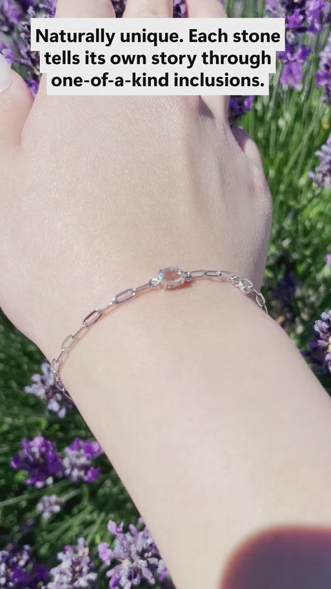 video of model wearing 925 Sterling Silver 6x4MM Natural Aquamarine and Canadian Diamond Paperclip Bracelet and close up of bracelet itself