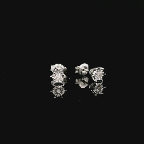 rotating video of 925 sterling silver solitaire diamond earrings in miracle setting, butterfly backing