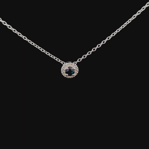 Rotating video of sterling silver sapphire and Canadian diamond halo pendant from all angles, showing the design and sparkle