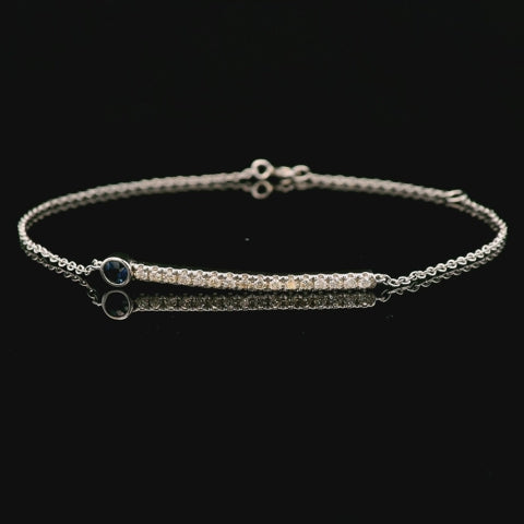 video of rotating bar bracelet featuring sapphire and diamonds
