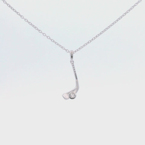 925 Sterling silver hockey stick charm with a Canadian diamond puck design hanging on a rolo chain rotating, showing a 360 degree view of the pendant design and sparkle.