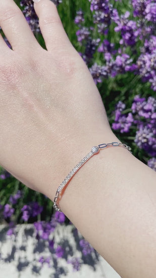 close up video of 925 Sterling Silver 0.28 CTW Canadian Diamond Half Tennis Paperclip Bracelet under sunlight