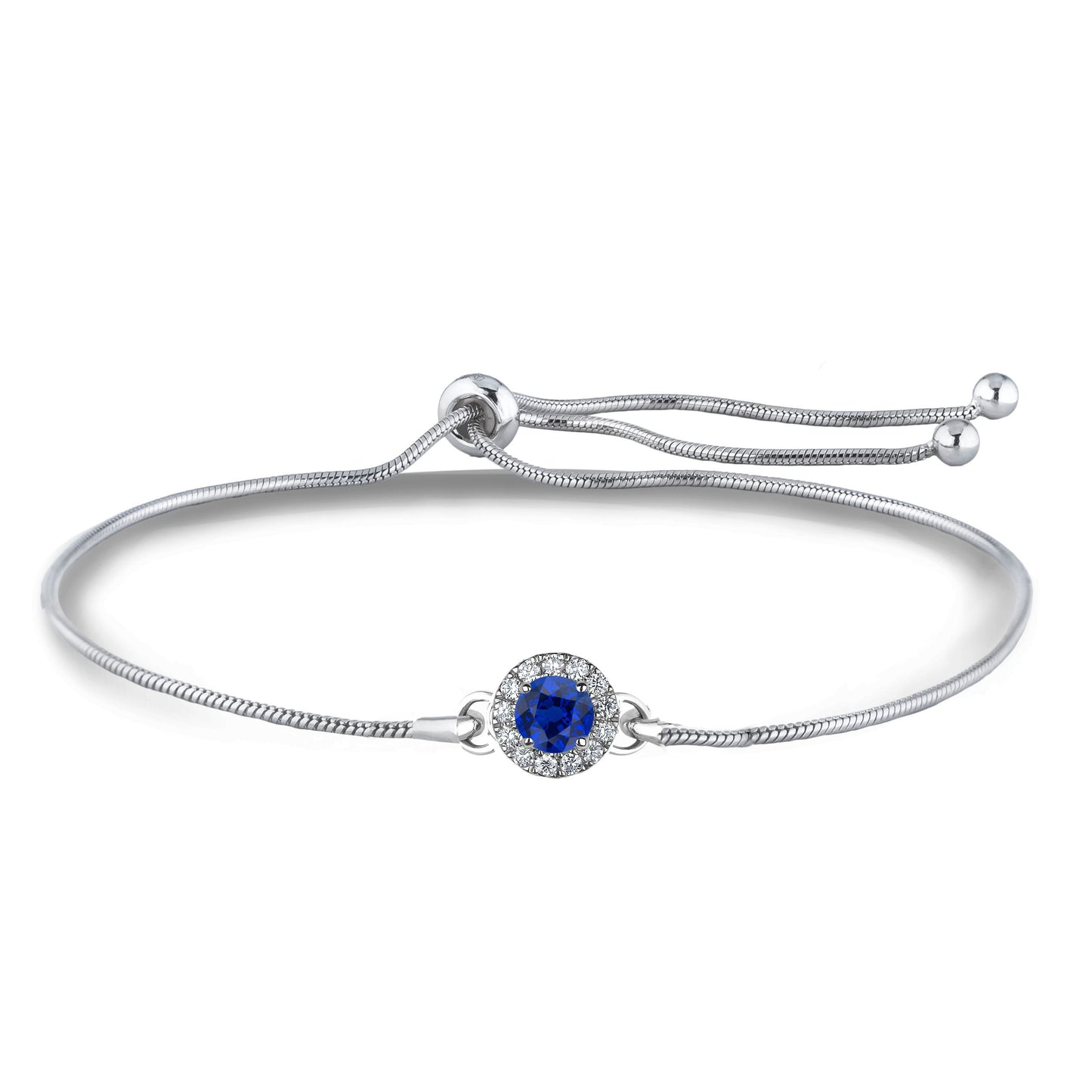 Close up of sterling silver bolo bracelet with a blue sapphire surrounded by Canadian diamonds in a halo setting on a white background